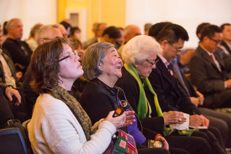 The audience included May Koo, George Koo's wife.